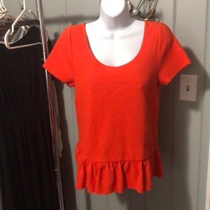 Anthropologie orange peplum top size small